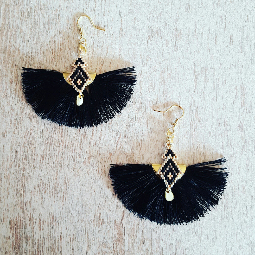 Boucles d'oreille A pompons